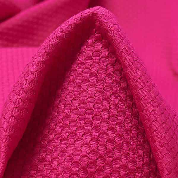 Stoffdetail des strukturierten hochwertigen Baumwollstoff in Pink